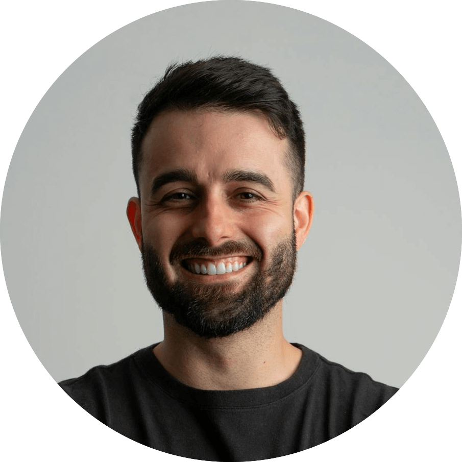 a man smiling at the camera