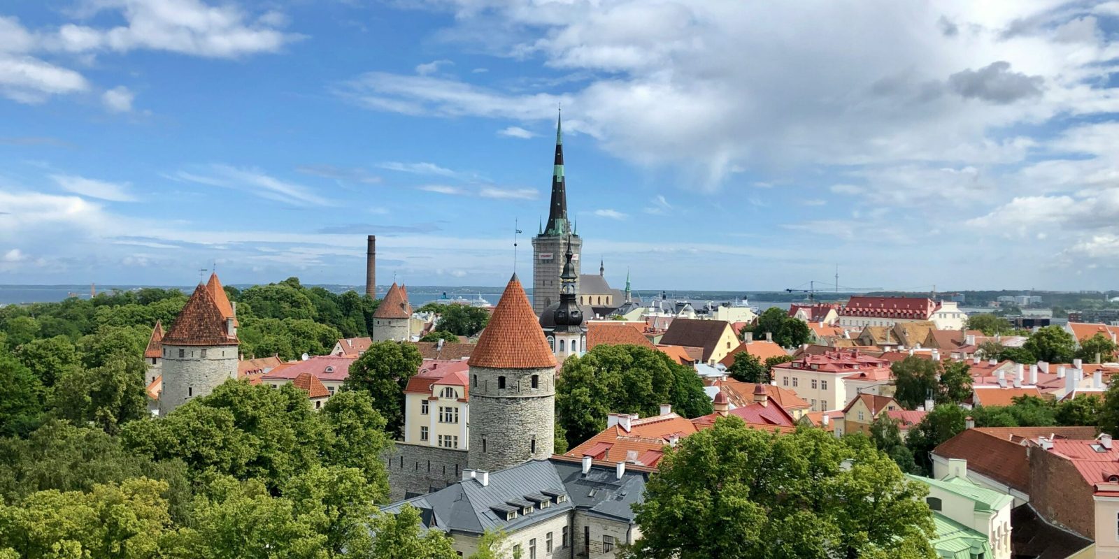 a city with many buildings and trees