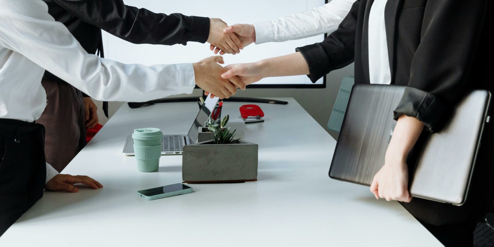 a group of people shaking hands